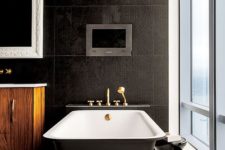 22 cool black bathtub on legs and with a black matte finish