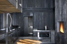 22 distressed grey wood looks cool with a shiny metal countertop
