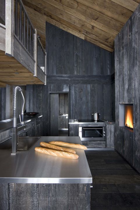 distressed grey wood looks cool with a shiny metal countertop