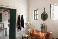 23 a free-standing copper bathtub is always an elegant and eye-catchy option