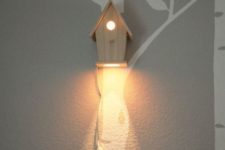25 a bird house wall lamp is great for woodland-themed and rustic kids rooms