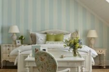 26 an elegant cottage bedroom with a shabby nightstand and a whitewashed sideboard