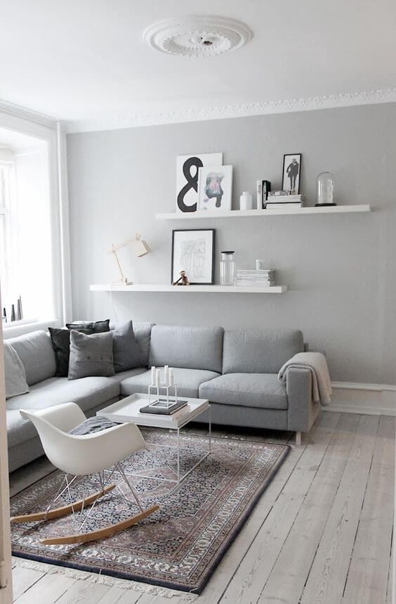 large floating shelves for storing magazines and displaying accessories and art