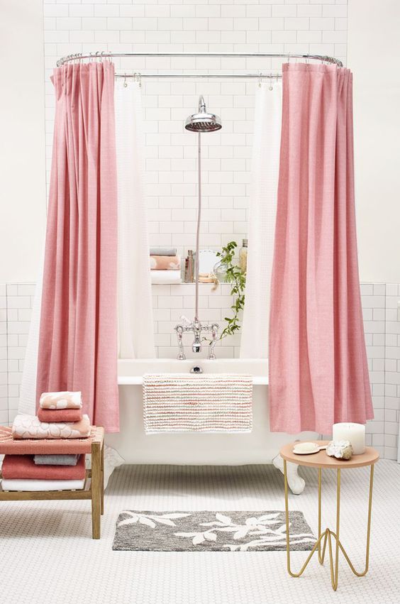 pink curtains can easily turn any usual bathroom into a feminine one