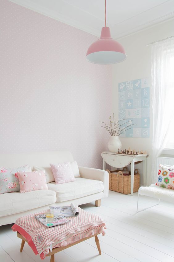 pink pendant lamp highlights the room decor and blends with the rest of the pieces