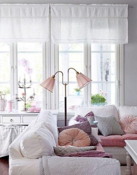 blush floor lamp with a double lampshade that reminds of a flower