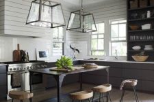29 metal and glass pendant lamps over the kitchen island