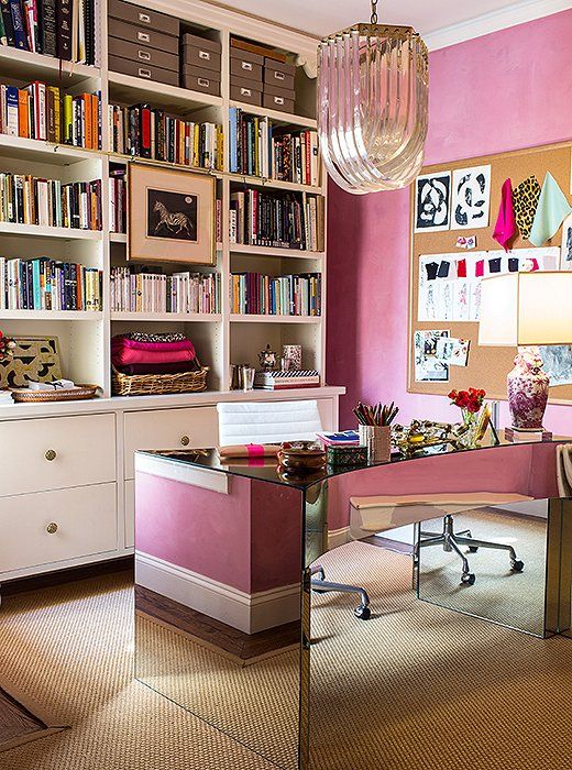 oversized metallic chandelier makes a statement in this office