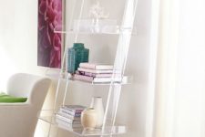 31 acrylic leaning bookshelf looks cool in this glam girlish space