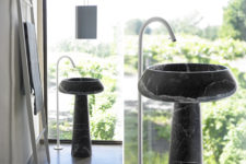 31 black marble free-standing sink is an elegant solution for a manly space