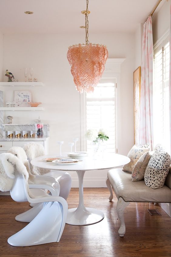 unique pink glass chandelier over the dining area