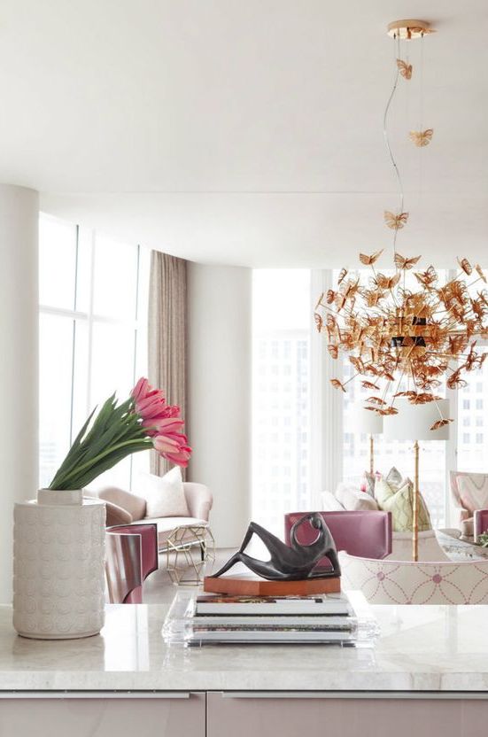 sculptural gold butterfly wedding chandelier makes a statement