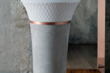 34 a concrete and copper free-standing sink with a pattern looks eye-catchy