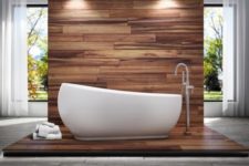 34 a wood tile wall and floor and an egg-shaped tub with a gentle slope