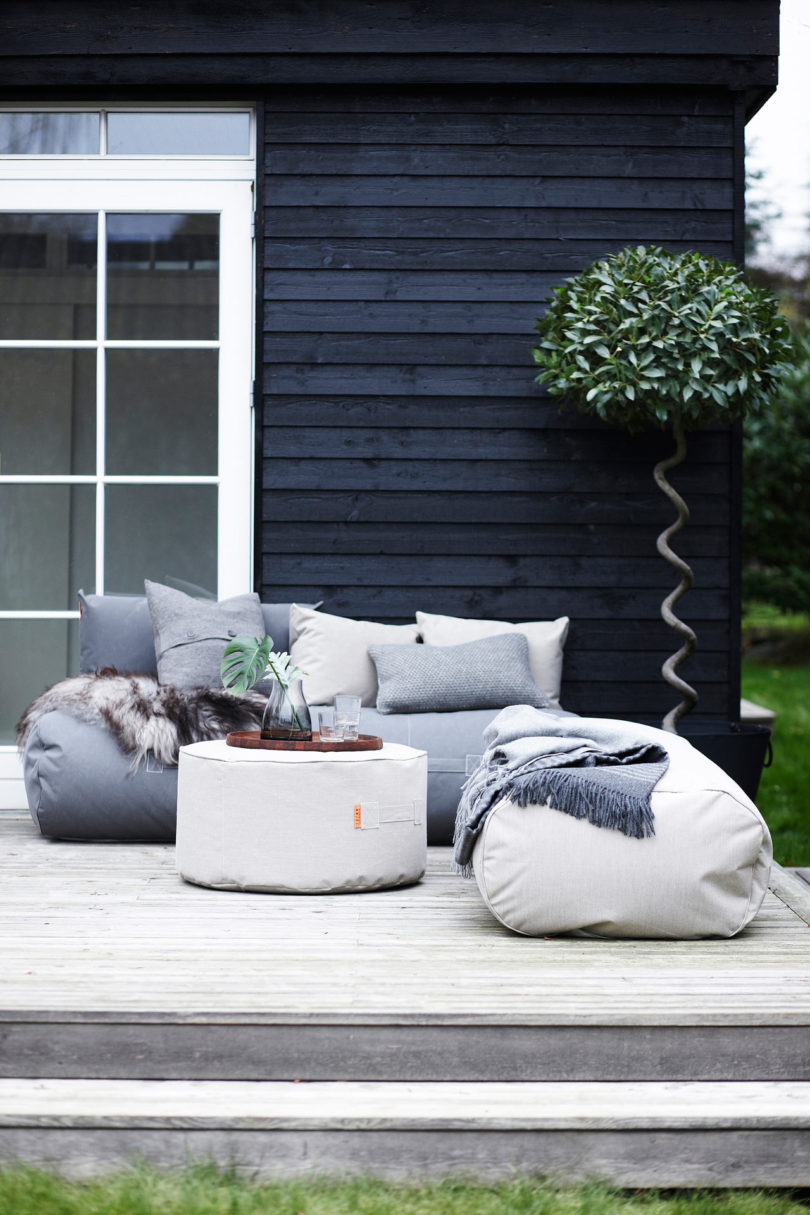 This outdoor furniture collection is made of bean bag chairs, cushions, ottomans and sofas with a truly Scandi feel