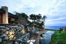 01 This stunning house is covered with stone that was excavated from its site and it faces the Pacific Ocean