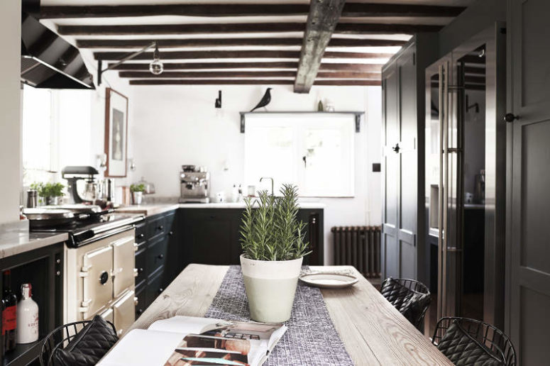 This traditional kitchen is located in a country cottage and its style is modern meets traditional