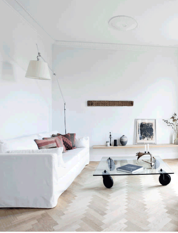 all white living room All-white rooms look more spacious and light-filled, and to soften them you can use cool wicker and wooden touches