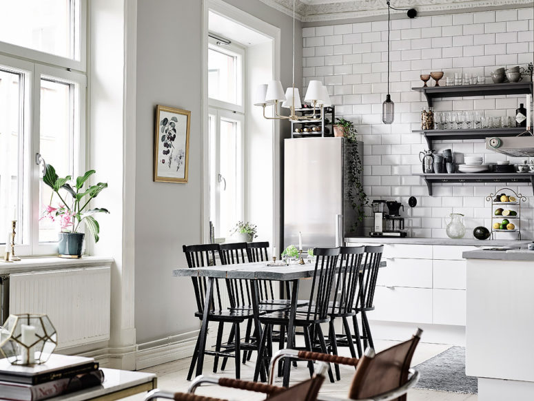 open plan kitchen design The kitchen is united with the dining and living spaces to create one open layout
