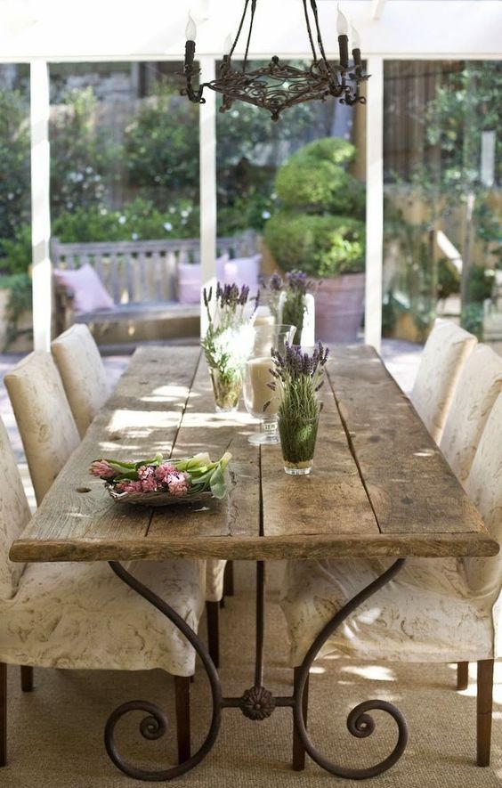 a rustic and shabby chic table with a rough edge and metal legs