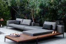 03 modular chaise lounge sofa on blackened metal frames and soft grey cushions