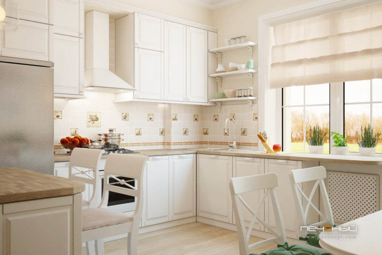 The kitchen is done in cream color, with a patterned backsplash and wooden countertops