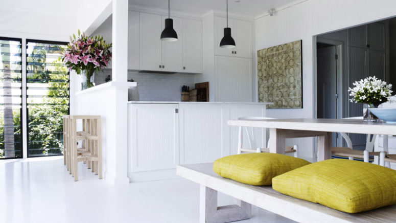 breakfast nook There's a small breakfast zone with wooden stools on the left of the kitchen space