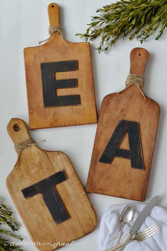cutting board EAT art is a great rustic idea