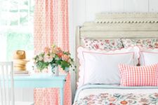 09 floral print curtains and a bedspread, a striped rug make this girlish bedroom cheer
