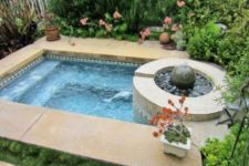 09 garden jacuzzi clad with stone tiles with greenery around