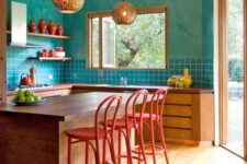 09 turquoise walls, tiles and red chairs for a Morocco-inspired interior