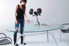 10 an oval glass top with unique spider-inspired legs that make it eye-catching