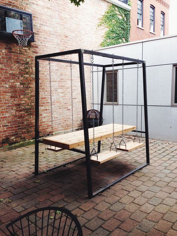 14 dining swingset with a suspended table and seats