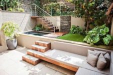15 a modern outdoor space with a plunge pool and a built-in bench with steps