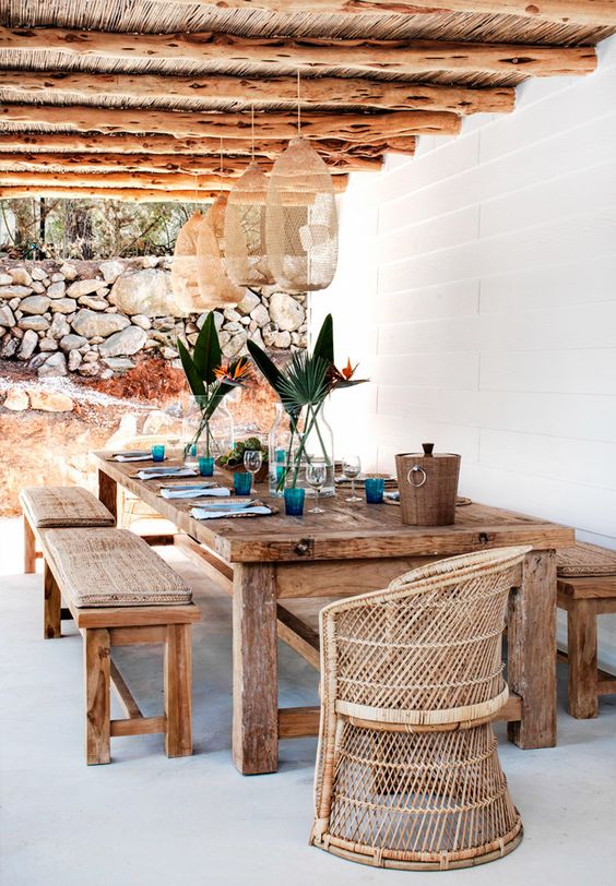 shabby rustic wooden table and benches for a Mediterranean terrace