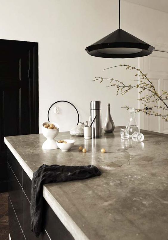 a polished concrete counter is ideal for a modern space