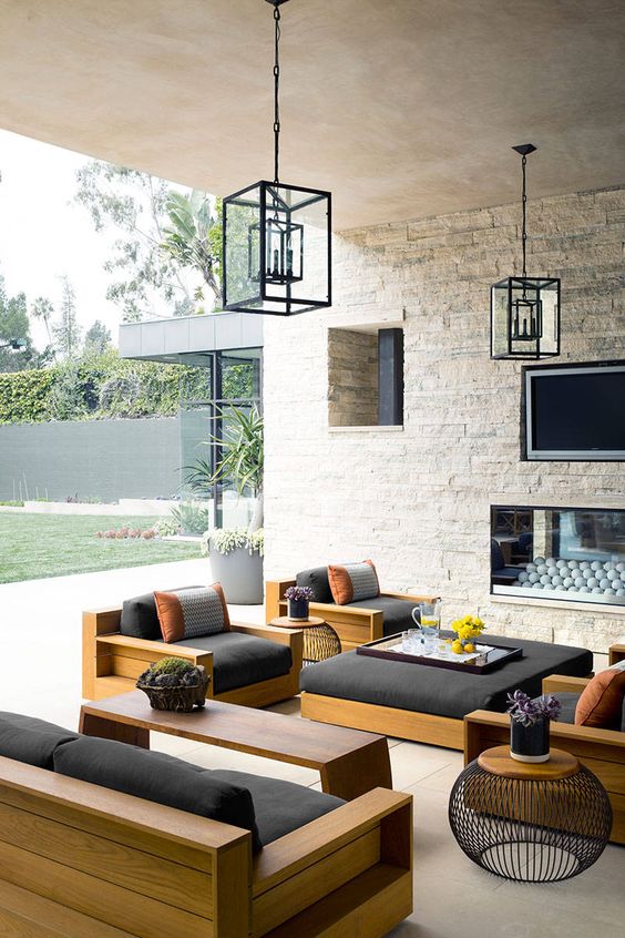 modern light-colored wood furniture with black cushions look chic and simple