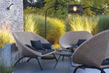 23 stylish rattan seat and chairs with black covers and cushions