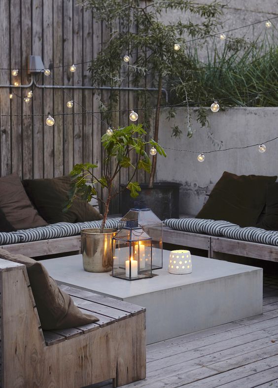 a simple square concrete coffee table is ideal for a modern ambience