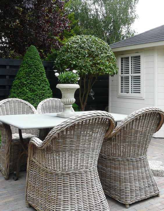 cute and simple wicker chairs with armrests fit any rustic space
