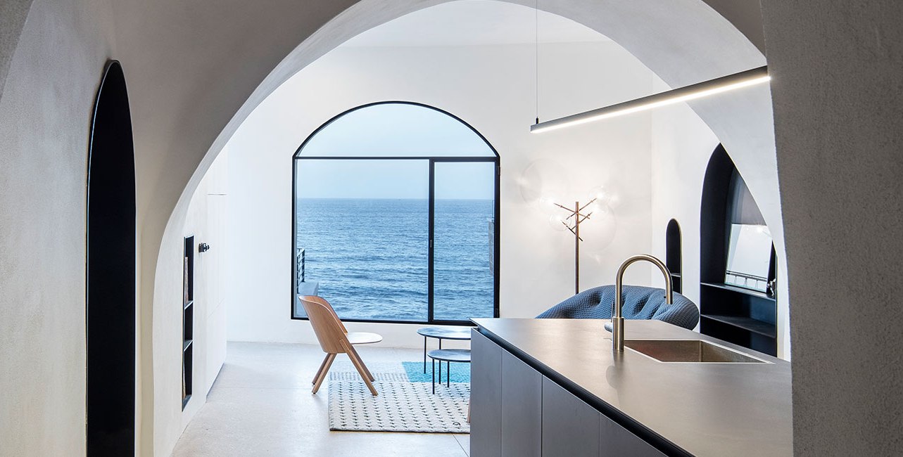 An old Jaffa house was transformed into a modern cave retreat with adorable sea views and light filled interiors