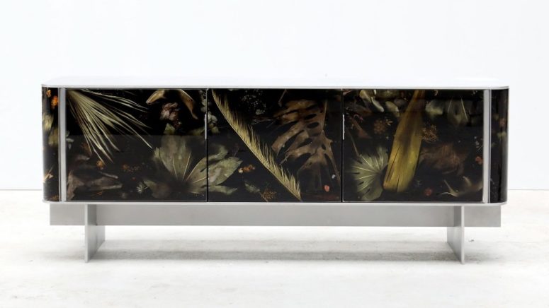 The console from Floral Noir collection has neutral framing and a gorgeous leaves in resin