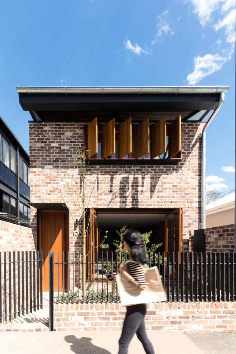 Industrial House With Rough Brick Walls And Much Wood