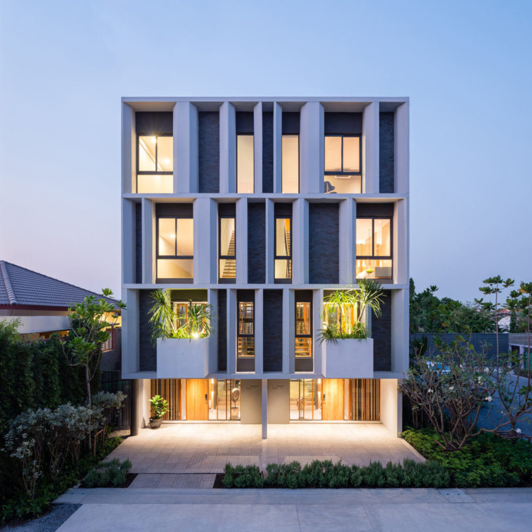 This modern townhouse in Bangkok can boast of its own large planters incorporated and a private garden