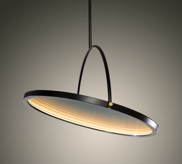 This unique piece is a lamp and a mirror in one, it can be hung anywhere where you need both pieces but don't have enough space This unique piece is a lamp and a mirror in one, it can be hung anywhere where you need both pieces but don't have enough space