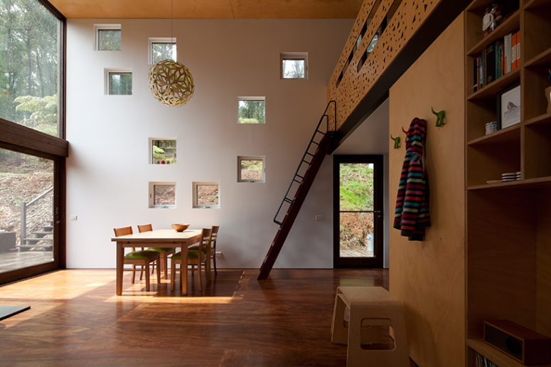 lots of wood in home's decor The interior is a large open plan space, with a mezzanine level that has a sleeping platform and much wood in decor