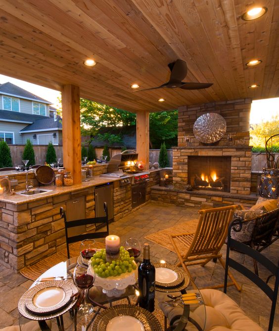 a fireplace for light and coziness and small LED lights over the whole kitchen and dining area