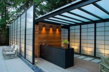 04 wall lights over the outdoor kitchen island to cook more comfortably