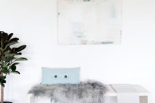 05 Textures add to the decor of this home, fur, stone, wood, greenery and pastel shades make it comfy