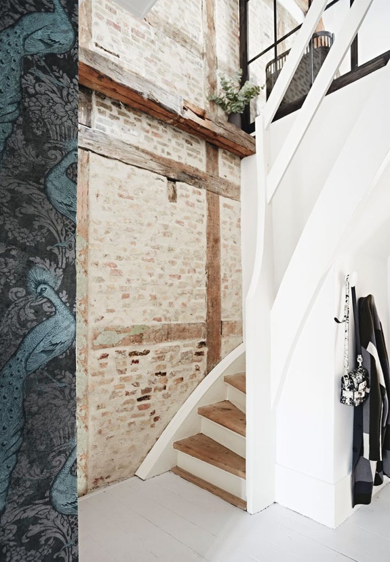 Original wooden beams and brick walls are preserved to give the space a character and make it more interesting Original wooden beams and brick walls are preserved to give the space a character and make it more interesting